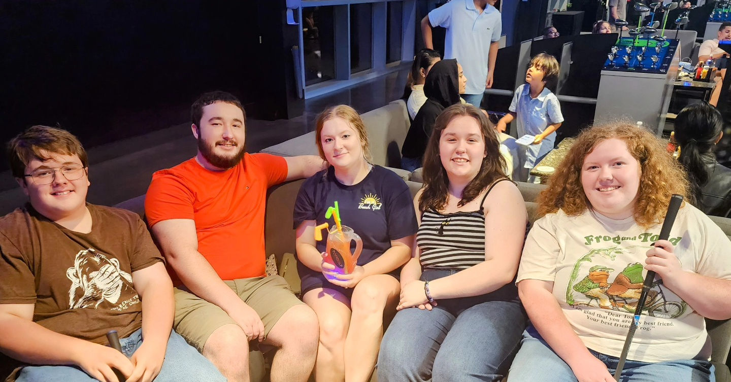 All our kiddos at Top Golf