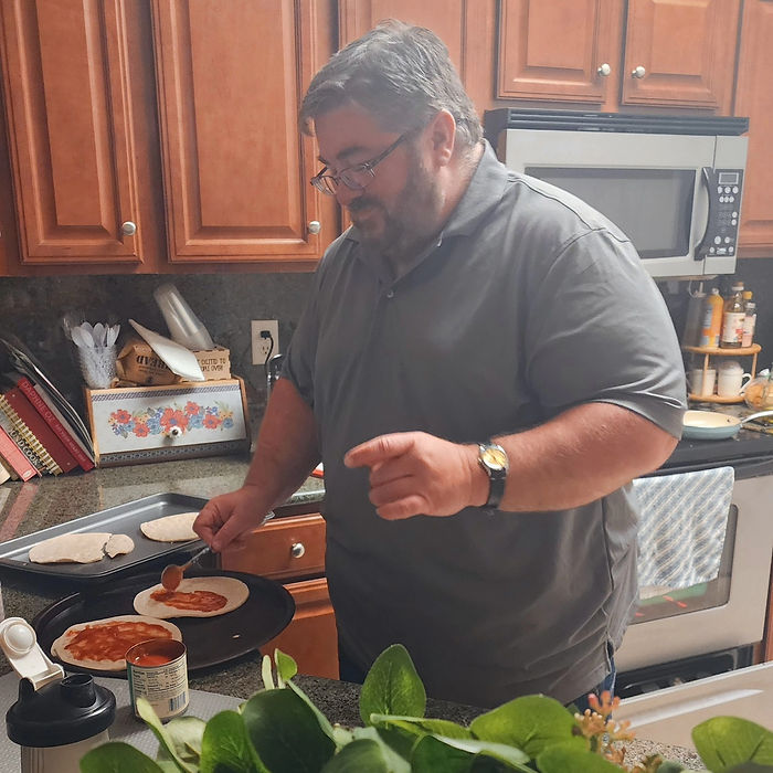 Scott making me my favorite pizza